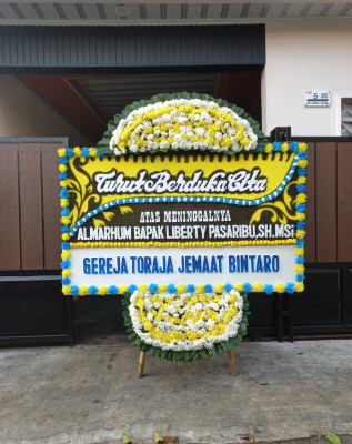 Papan Bunga Duka di Adipala
